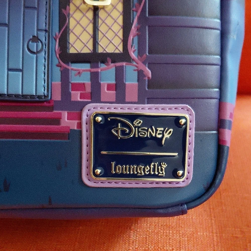 Glow In The Dark. Loungefly Disney Haunted House Backpack - Blue and Purple